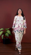 Women Floral Printed Cotton Kurta with Trousers